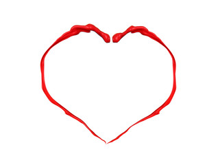 Red heart made of paint splash isolated on white