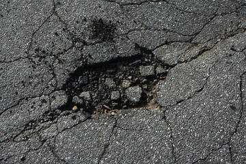 cracked asphalt road surface background