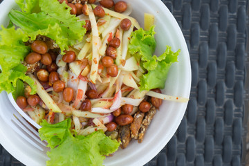 Thai style mango salad with hot and spicy