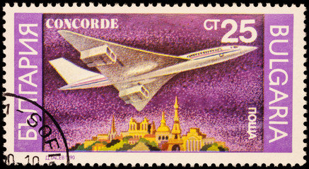 Supersonic passenger aircraft Concorde on postage stamp