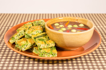 fried acacia omelet with chili paste thai style