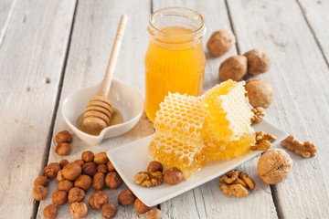honey in honeycombs on a table, selective focus