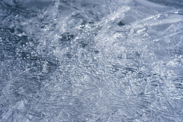 The ice cracked on a lake.