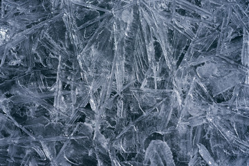 The ice cracked on a lake.