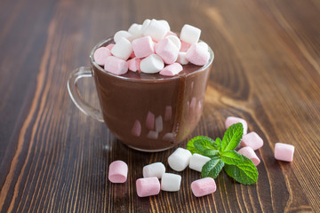hot chocolate with a souffle in a glass on a table, selective focus