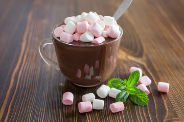 hot chocolate with a souffle in a glass on a table, selective focus