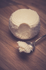 Cottage cheese on wooden background