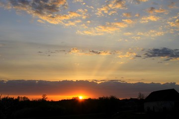Sunrise above countryside 
