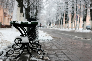 bench winter sidewalk