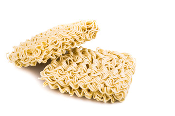 Uncooked instant noodles on white background