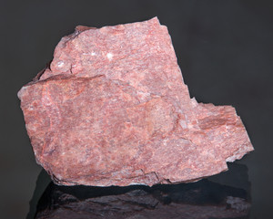 Mineral feldspar. Feldspars crystallize from magma as veins in both intrusive and extrusive igneous rocks and are also present in many types of metamorphic rock. 