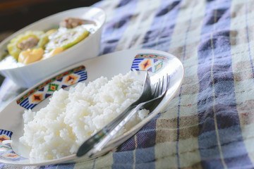 Fototapeta na wymiar Cooked rice in white dish