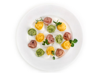 Ravioli of different colors top view
