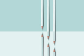 line of pastel light blue color pencils