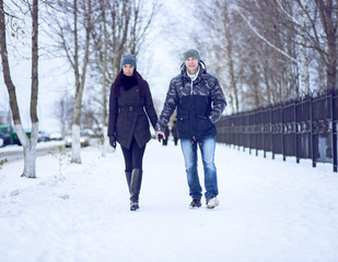 Fototapeta na wymiar Beautiful adult couple love, park in winter