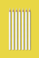 composition of Yellow and white color pencils