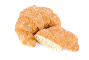 Fresh and tasty croissant over white background