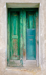 Green window with broken glass