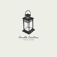 Rustic candle lantern logo in the style of a sketch. The symbol of warmth and comfort.