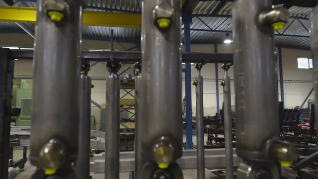 The big shock absorber of metal equipment. It is a big machine used inside the manufacturing factory