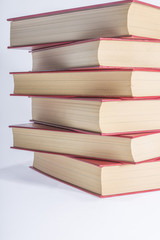 stack of books on white background