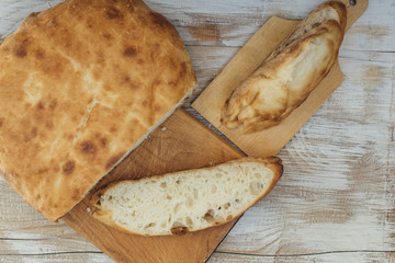 Pieces of rustic round loaf bread