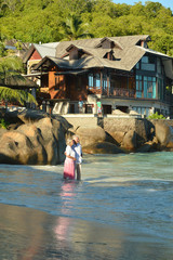 elderly couple rest at tropical resort
