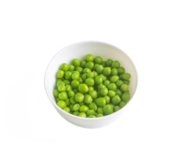 green peas in a white bowl isolated