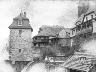 Black and white cityscape of the medieval town with gates tower. Rothenburg, Bavaria, Germany.