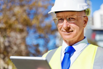 Engineer builder at construction site