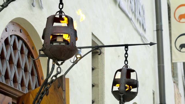 The fire lamps outside the building on the streets of Italy