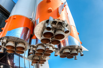 Detail of space rocket engine against the blue sky