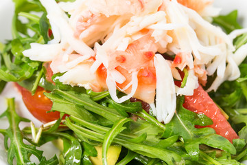 Snow crab salad with pomelo and arugula.