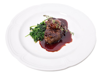 Delicious fillet mignon steak with chard.