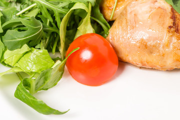 Grilled chicken fillet with tomatoes cherry.