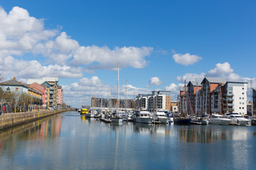Fototapeta premium Portishead marina near Bristol Somerset UK boats moored at quayside and apartments 