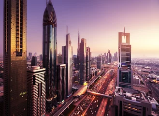 Rolgordijnen Dubai De skyline van Dubai in zonsondergangtijd, Verenigde Arabische Emiraten
