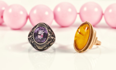 Vintage silver ring with a large amethyst and gold ring with amb