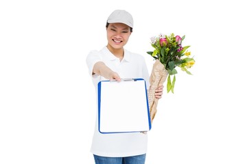 Delivery woman with bouquet and clipboard