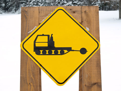 Ski Trail Tractor Sign On Forest Background