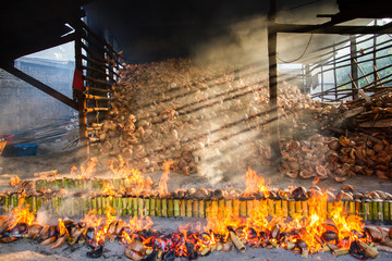 Incineration plant burns rice roasted in bamboo. sticky rice soa
