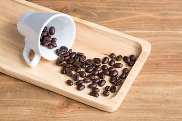 Coffee bean on wooden board