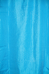 Fototapeta premium Tissu bleu froissé