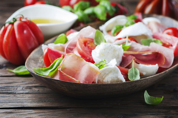 Italian salad caprese with ham