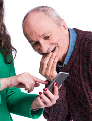  Man and woman watching smart phone