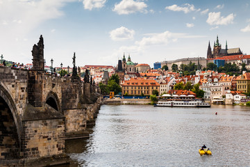 Fototapeta na wymiar PRAGUE, CZECH REPUBLIC - JULY 18: View to the Vltava River from