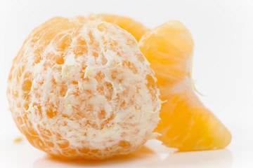 Closeup on Orange Clementines in Bright Studio