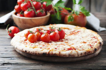 Italian homemade pizza margherita with tomato