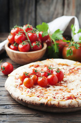 Italian homemade pizza margherita with tomato and mozzarella