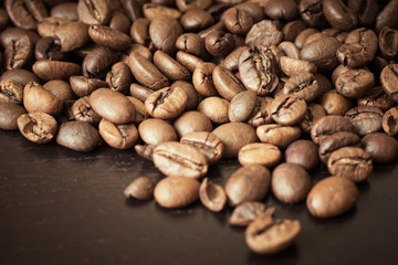 Coffee beans on a wooden table